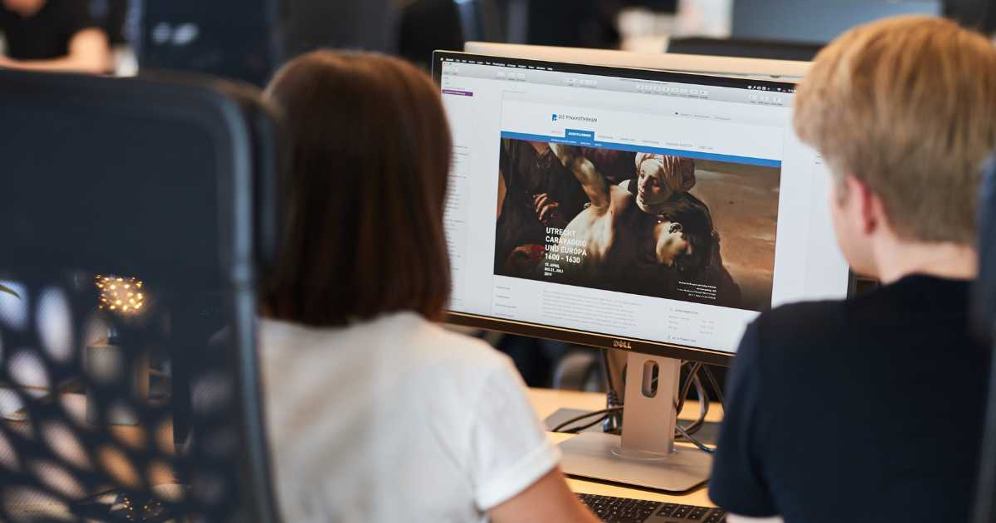 Woman and man browsing the website